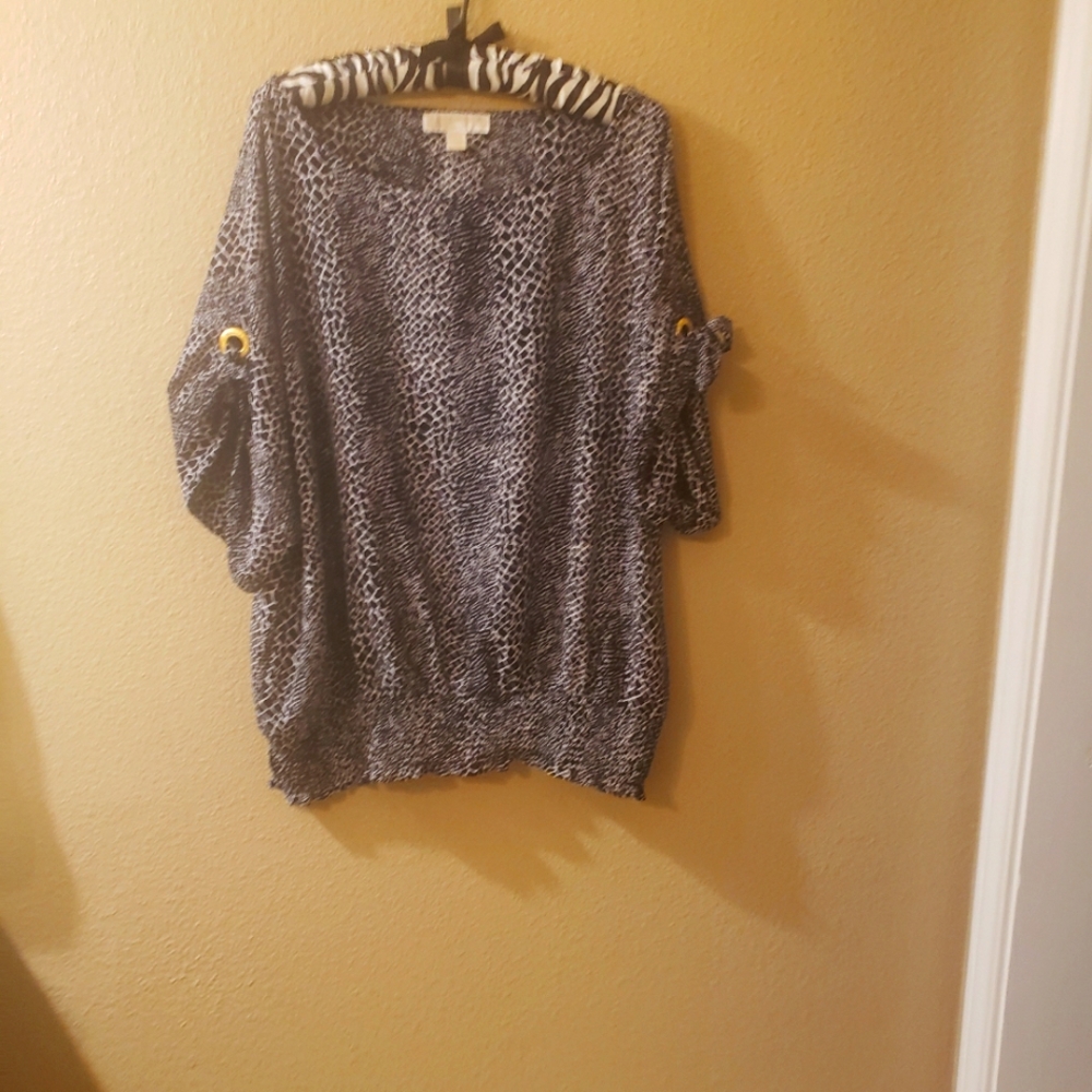 Michael Kor's animal print blouse in polyester NWOT